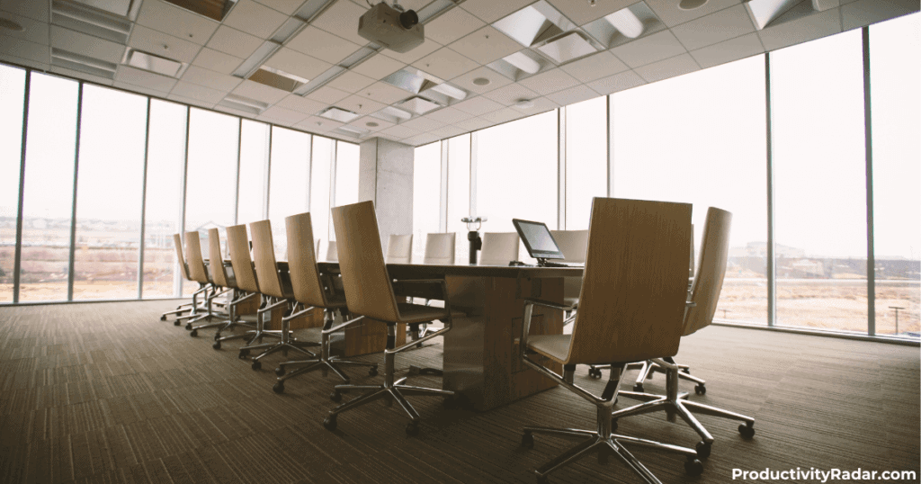 Executive boardroom with floor-to-ceiling windows and conference table - ChatGPT prompts for self-evaluations