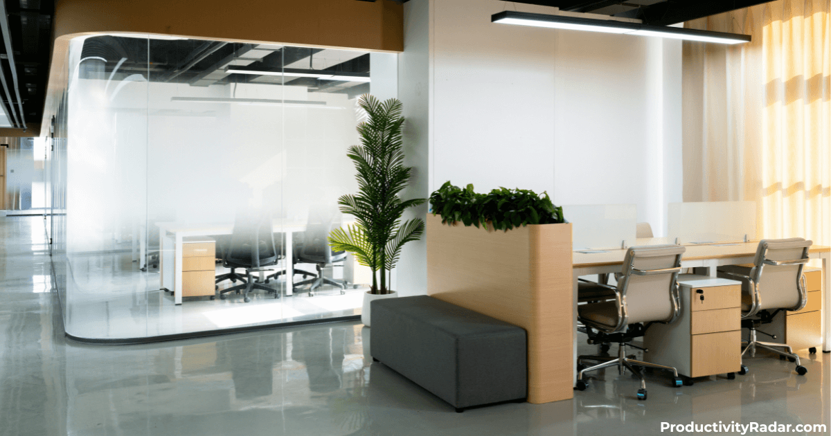 A clean office space with grey floors and tan accents in the the chairs and filing cabinets used for AI Planning for Managers
