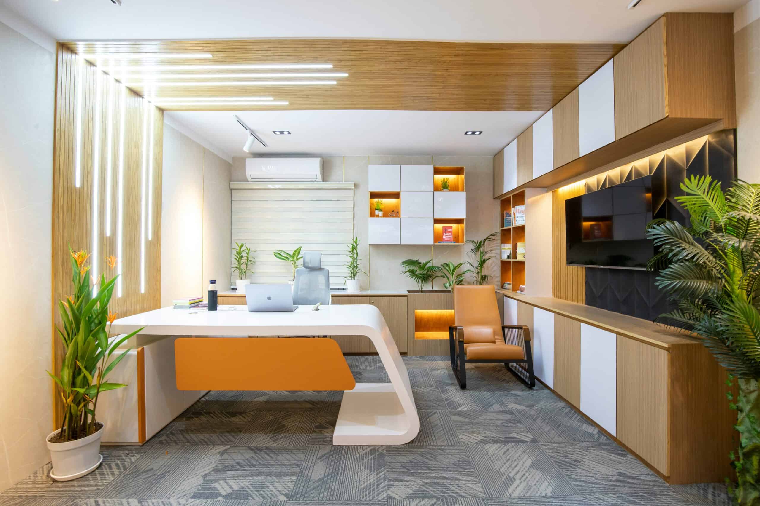 modern executive office with curved white desk, laptop, indoor plants, and wood-panelled ceiling — a manager's workspace for ai for mid-year reviews